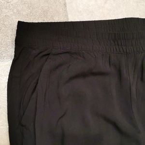 Black jogger-style trouser pants